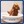 A small brown dog standing in a white plastic tub with a yellow rubber duck on its head. The image has a blue border and text at the bottom that reads, 'TEAR FREE, QUICK RISNE FORMULA FOR LESS FUSS'.