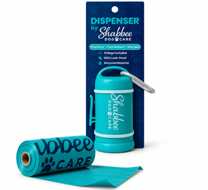 A teal dog poop bag dispenser and roll of dog waste bags by Shabbee Dog Care, shown with the branded hanging card on a clean white background.