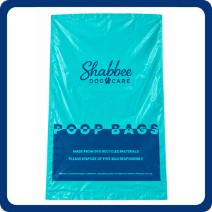 A large teal and dark blue Shabbee Dog Care poop bag, printed with 'POOP BAGS' and recycling information, shown flat against a light gray background with a blue border.
